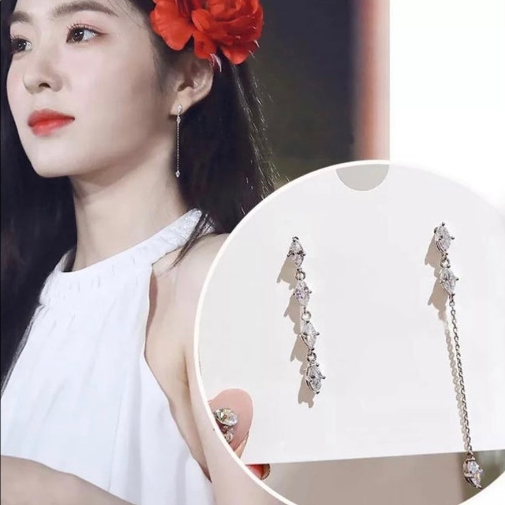 Asymmetric cubic zirconia earrings. New in box